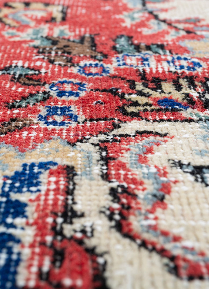 vintage red and orange wool hand knotted Rug - CloseUp