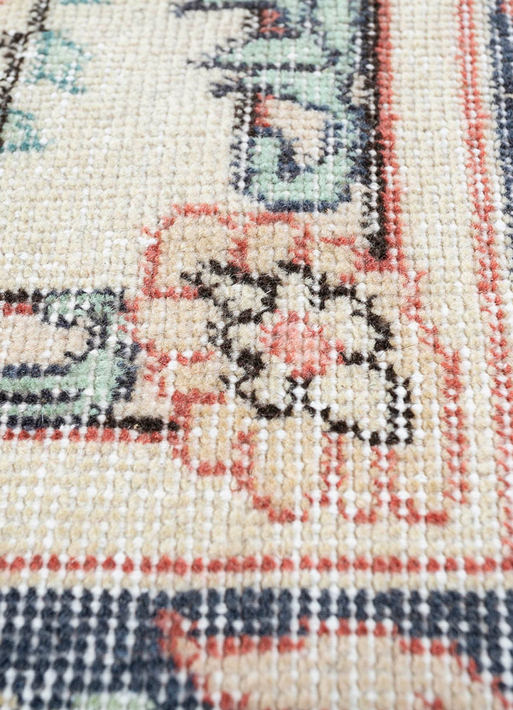 vintage red and orange wool hand knotted Rug - CloseUp