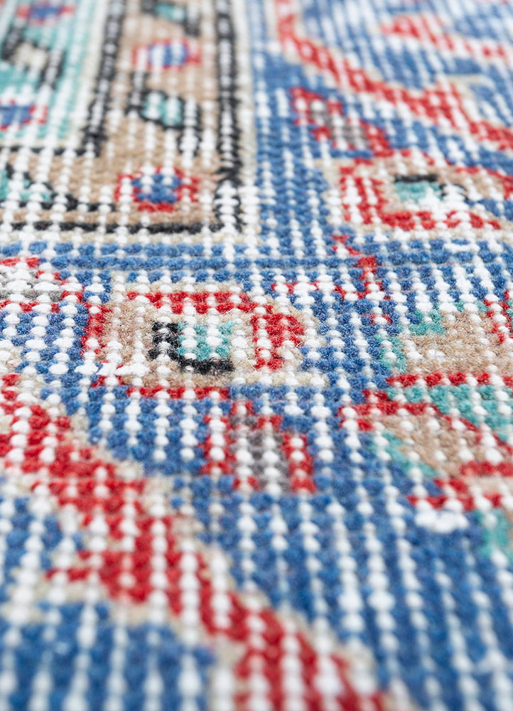 vintage red and orange wool hand knotted Rug - CloseUp