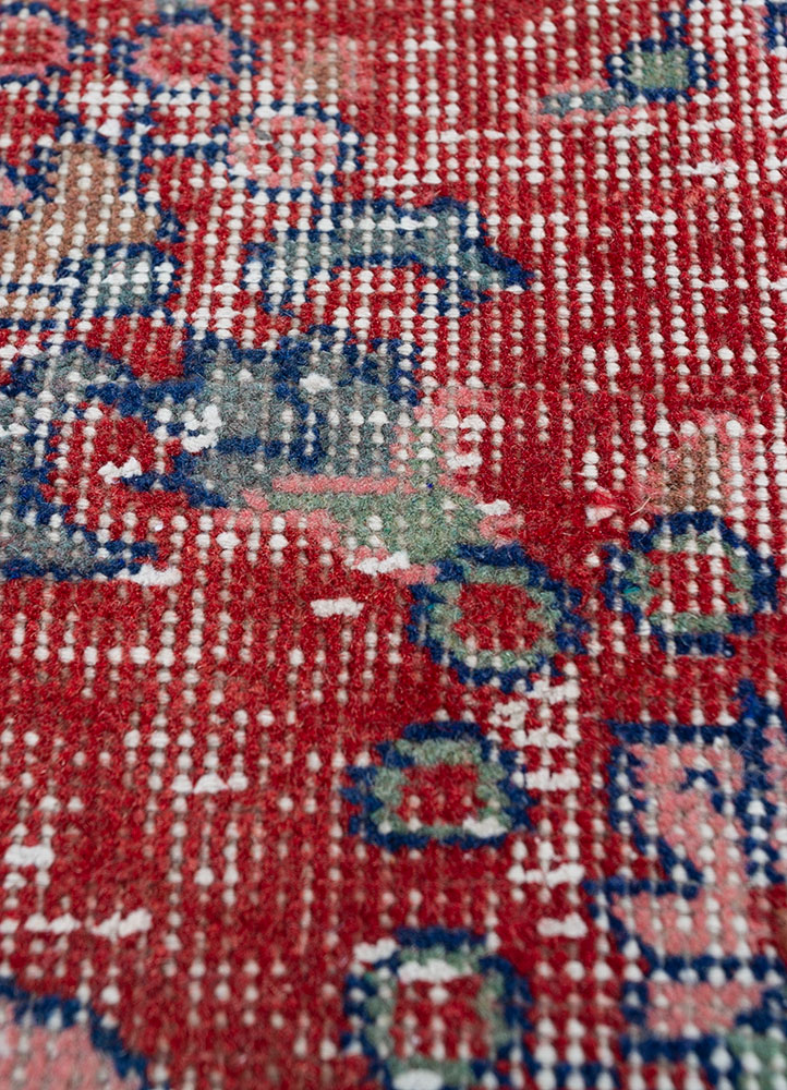 vintage red and orange wool hand knotted Rug - CloseUp