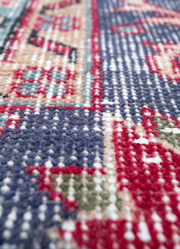 vintage red and orange wool hand knotted Rug - CloseUp