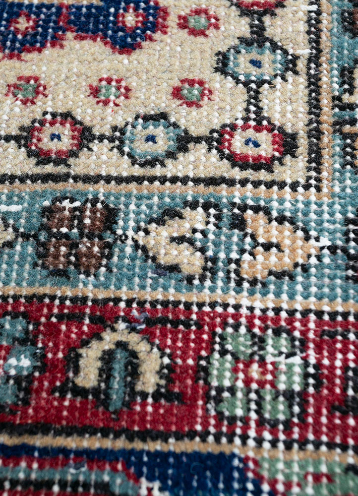 vintage red and orange wool hand knotted Rug - CloseUp