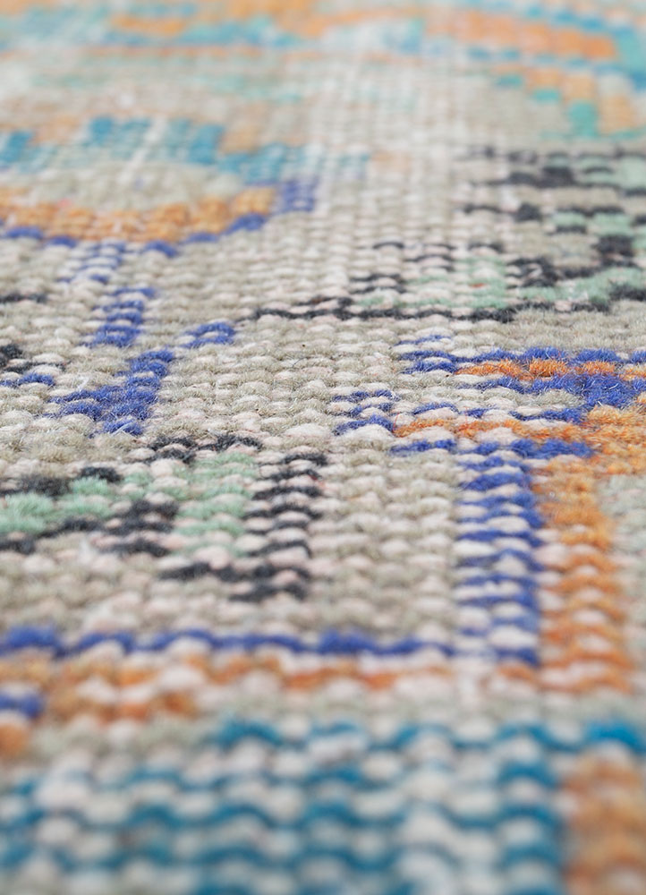vintage red and orange wool hand knotted Rug - CloseUp