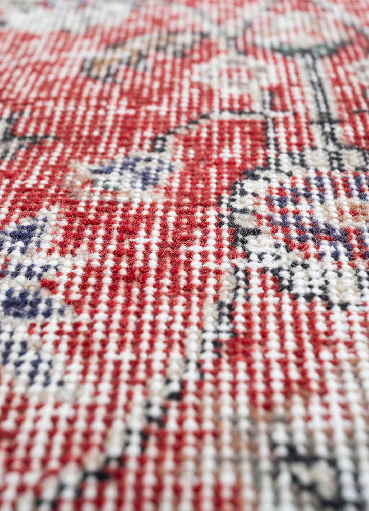 vintage red and orange wool hand knotted Rug - CloseUp
