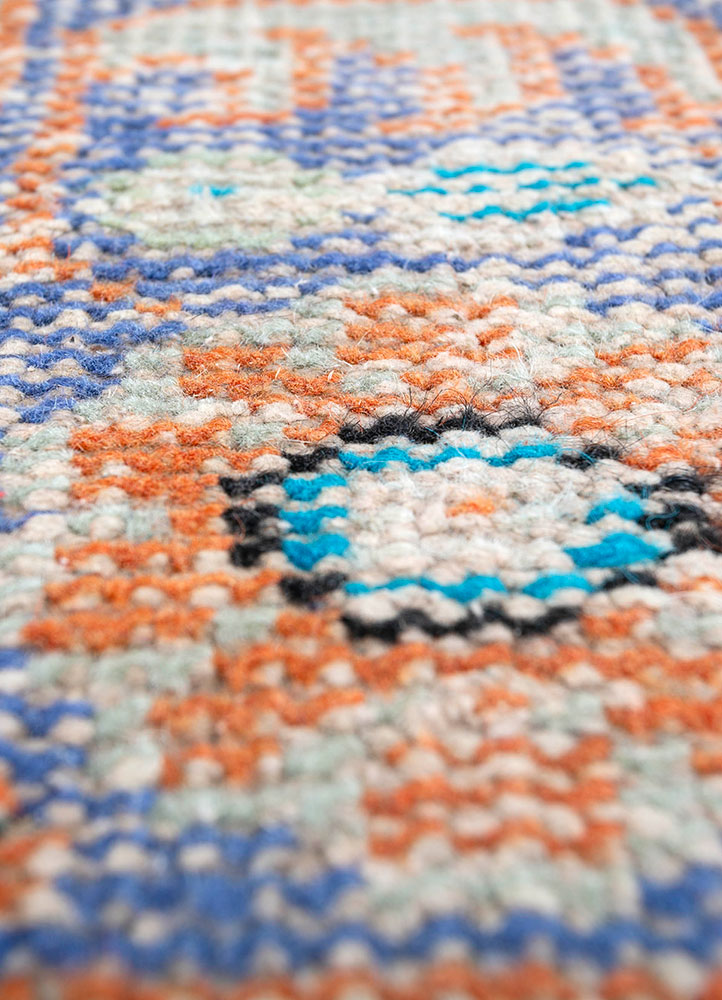 vintage red and orange wool hand knotted Rug - CloseUp