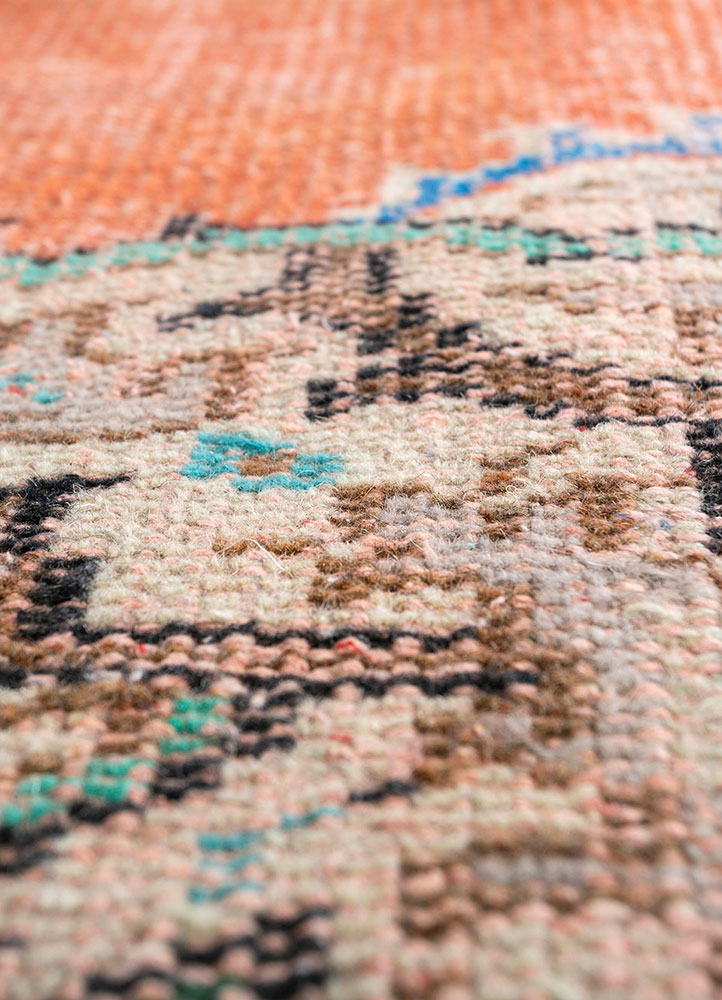 vintage red and orange wool hand knotted Rug - CloseUp