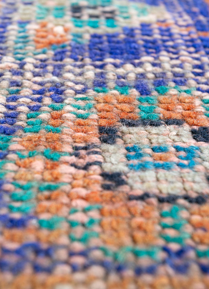 vintage red and orange wool hand knotted Rug - CloseUp