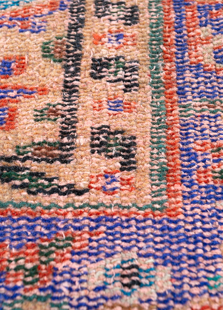 vintage red and orange wool hand knotted Rug - CloseUp