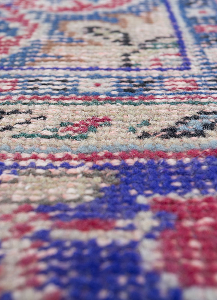 vintage red and orange wool hand knotted Rug - CloseUp
