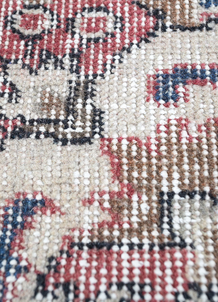 vintage red and orange wool hand knotted Rug - CloseUp
