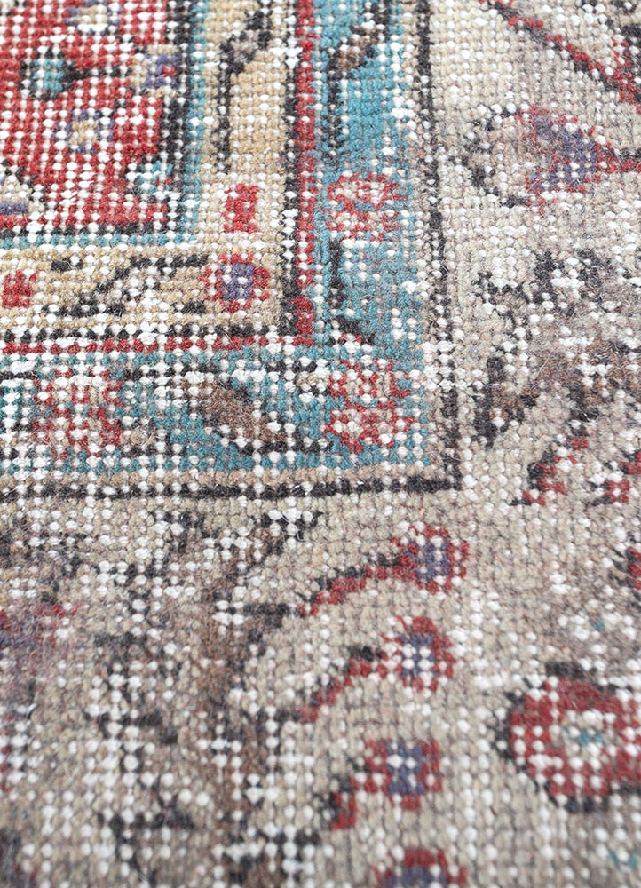 vintage red and orange wool hand knotted Rug - CloseUp
