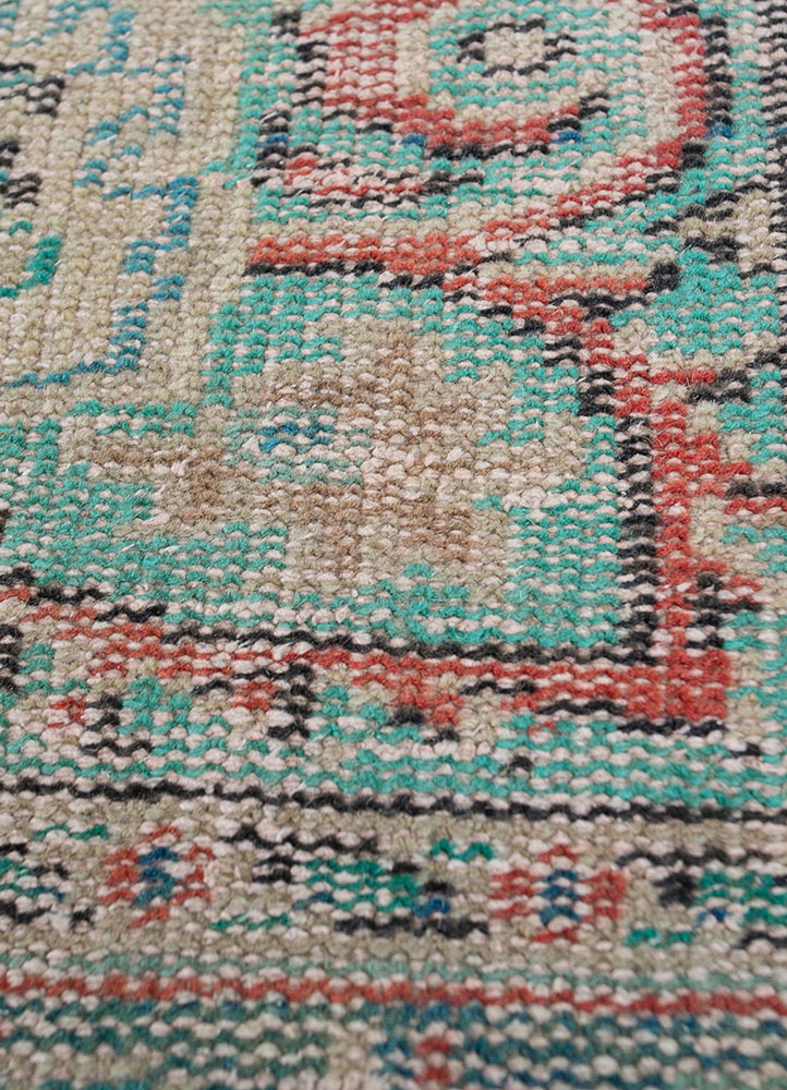 vintage red and orange wool hand knotted Rug - CloseUp