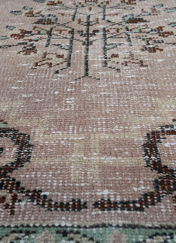 vintage pink and purple wool hand knotted Rug - CloseUp