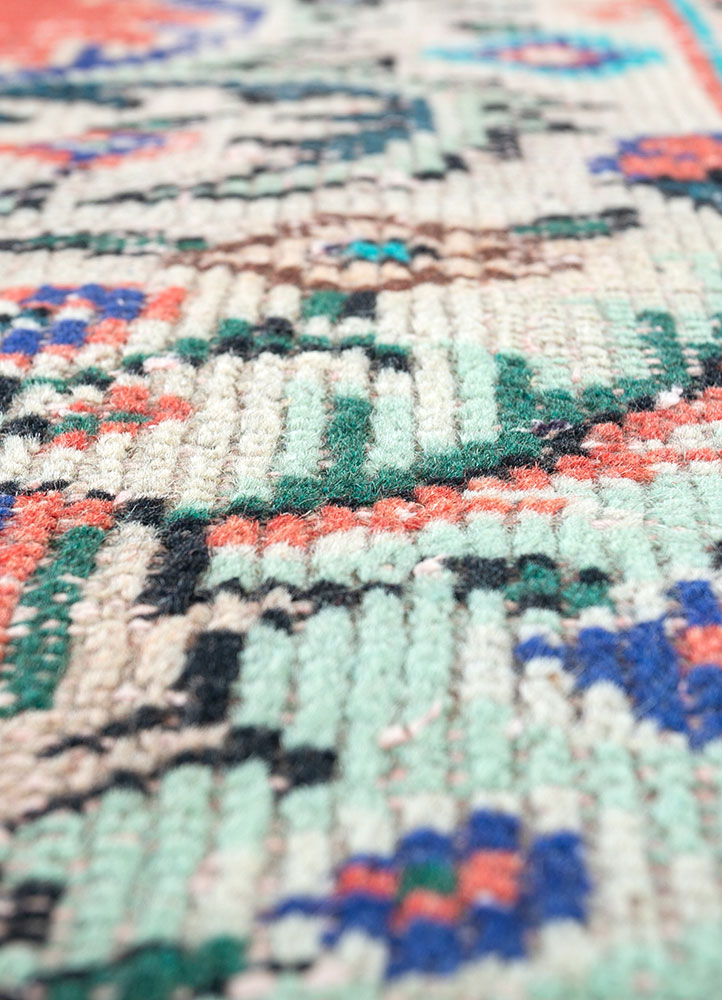 vintage red and orange wool hand knotted Rug - CloseUp