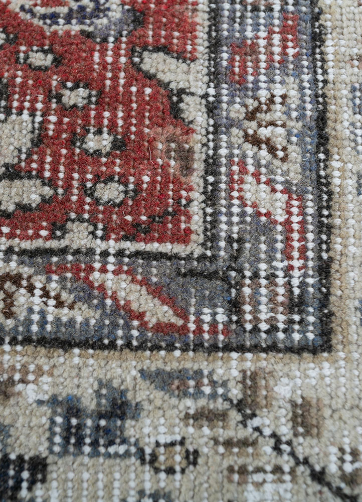 vintage red and orange wool hand knotted Rug - CloseUp