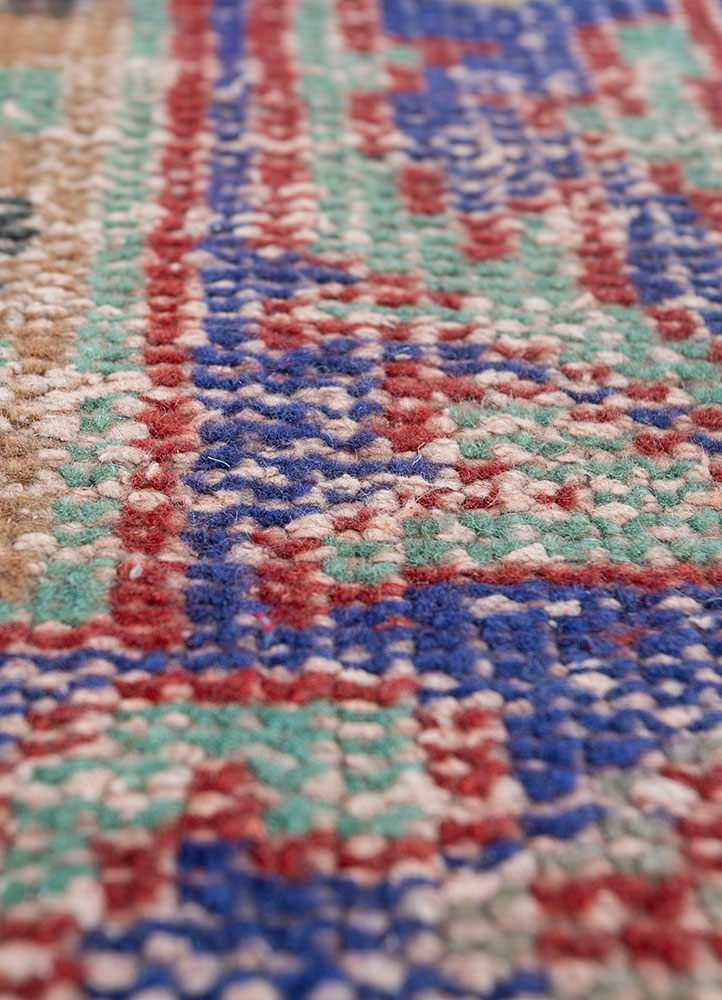 vintage red and orange wool hand knotted Rug - CloseUp