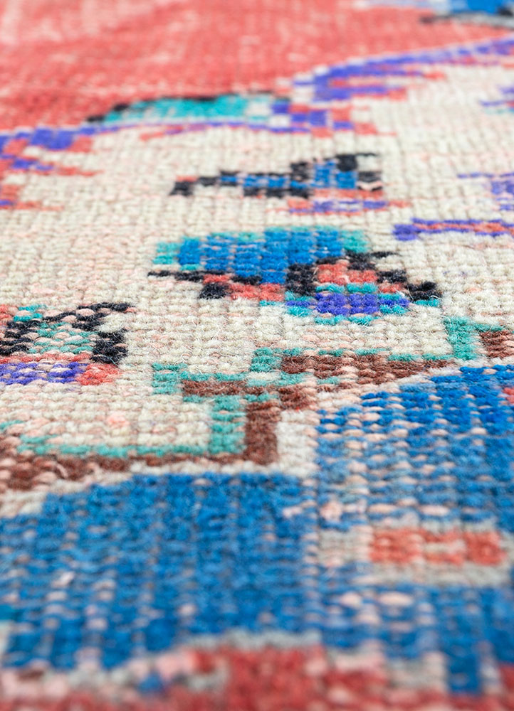 vintage red and orange wool hand knotted Rug - CloseUp