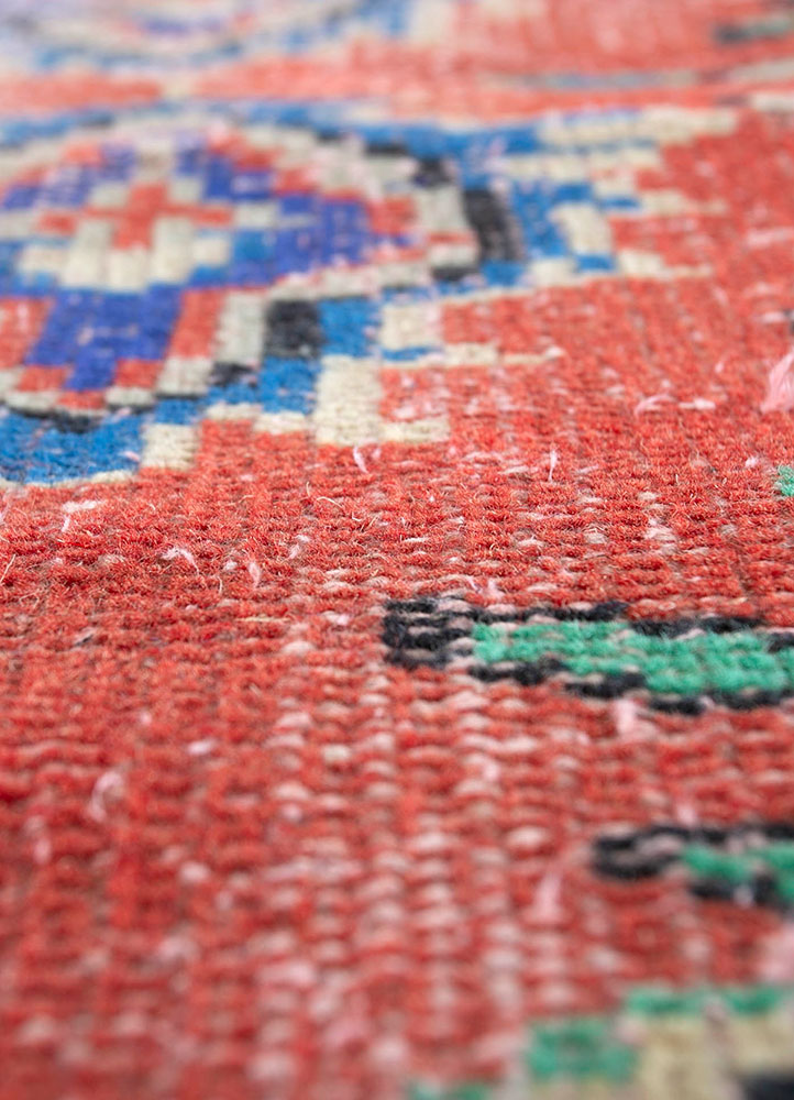 vintage red and orange wool hand knotted Rug - CloseUp