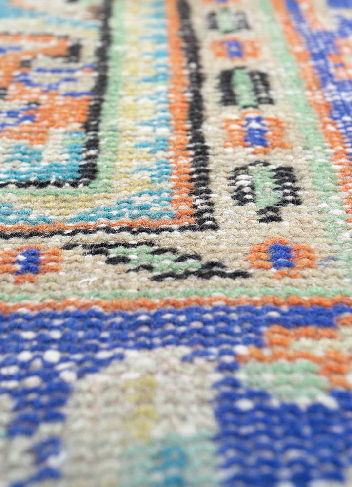 vintage red and orange wool hand knotted Rug - CloseUp