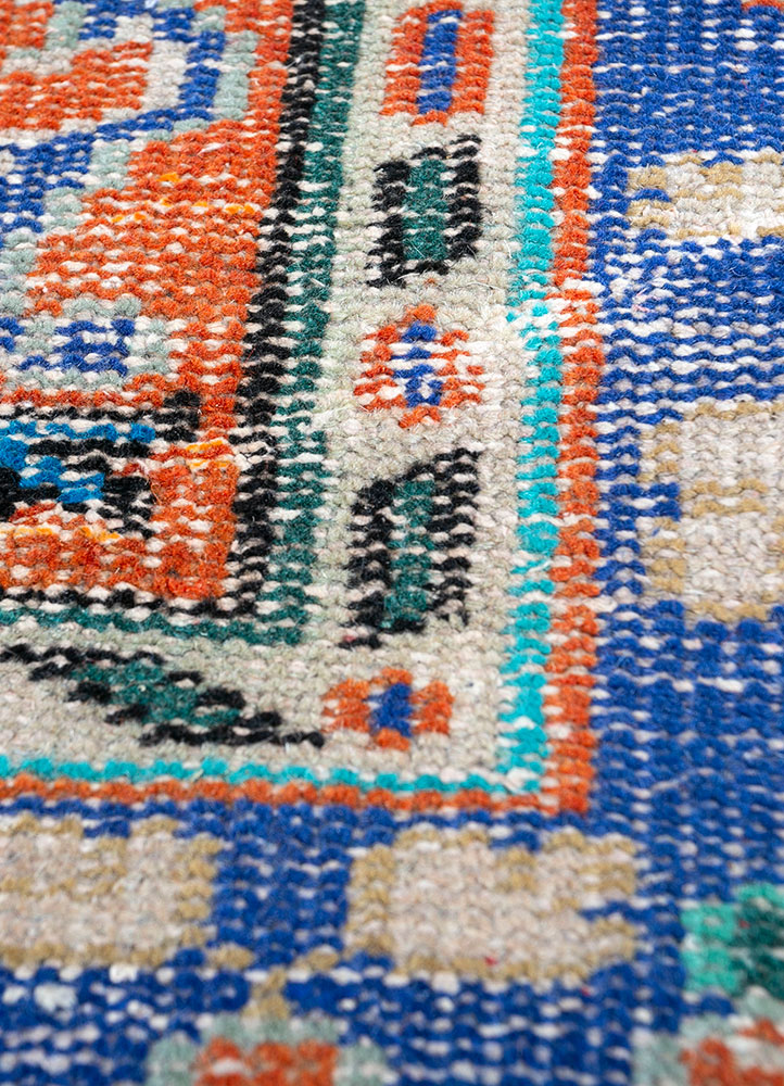 vintage red and orange wool hand knotted Rug - CloseUp