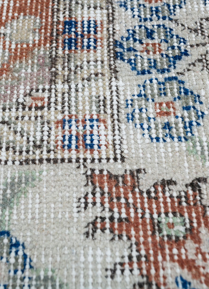 vintage red and orange wool hand knotted Rug - CloseUp