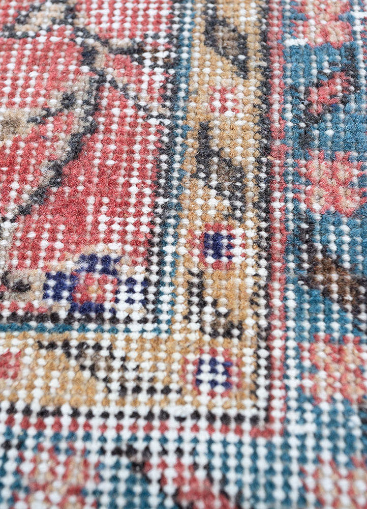 vintage red and orange wool hand knotted Rug - CloseUp