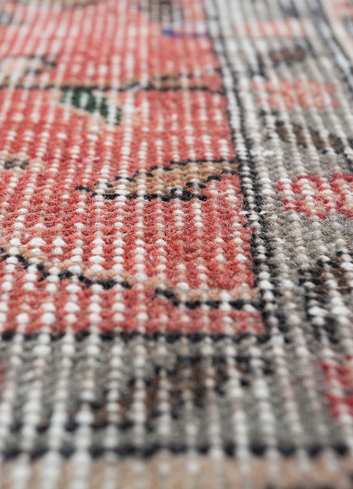 vintage red and orange wool hand knotted Rug - CloseUp