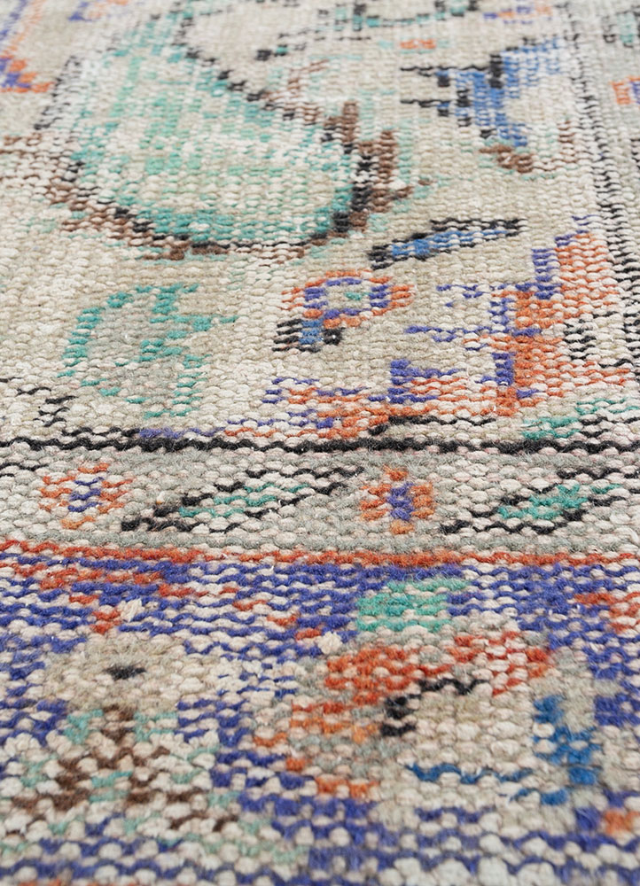 vintage red and orange wool hand knotted Rug - CloseUp