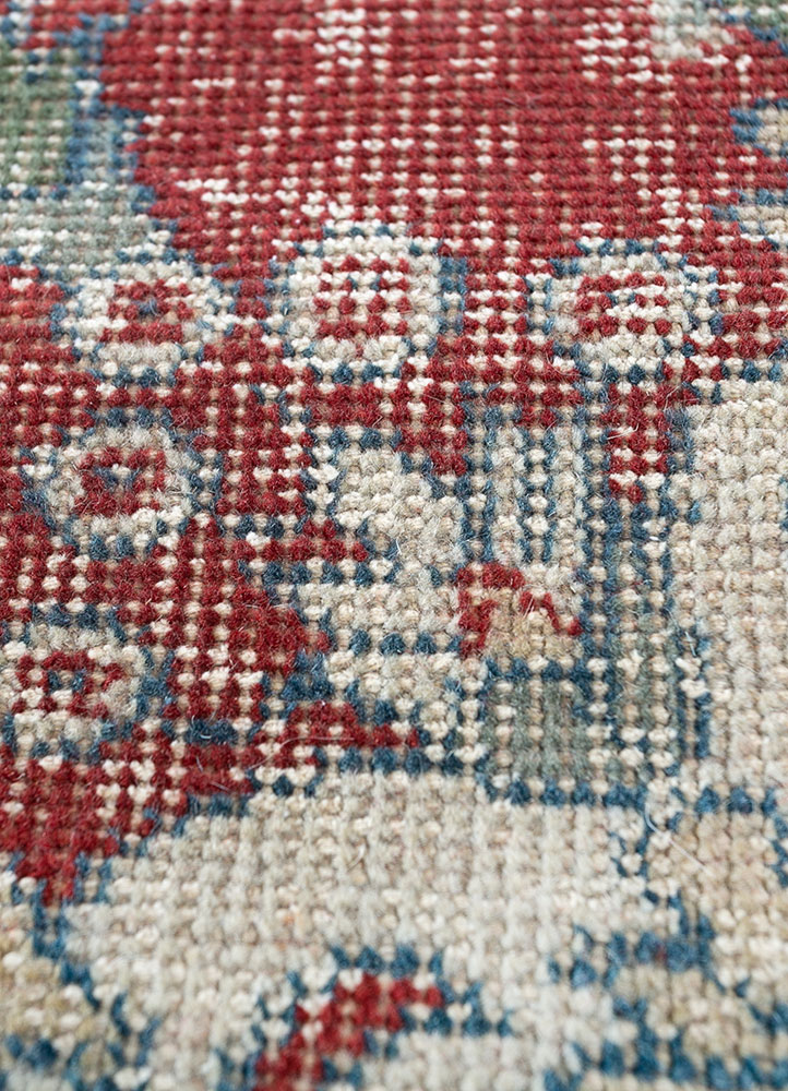 vintage red and orange wool hand knotted Rug - CloseUp