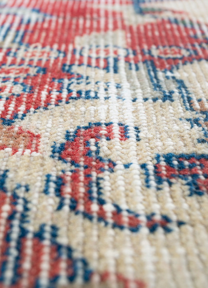 vintage red and orange wool hand knotted Rug - CloseUp