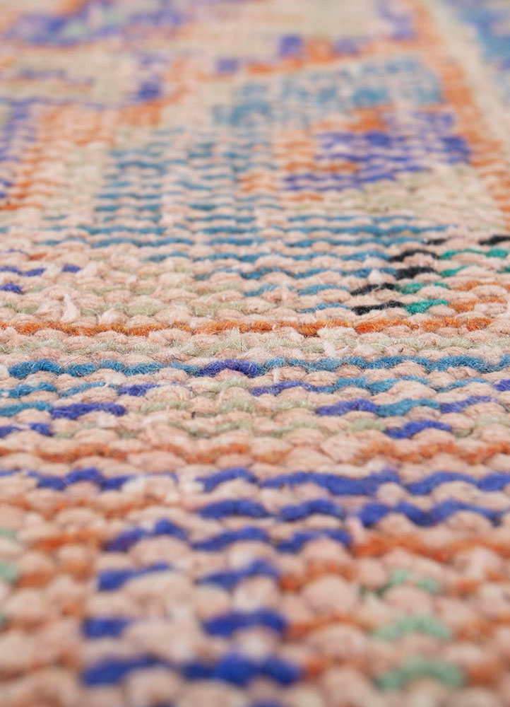 vintage red and orange wool hand knotted Rug - CloseUp