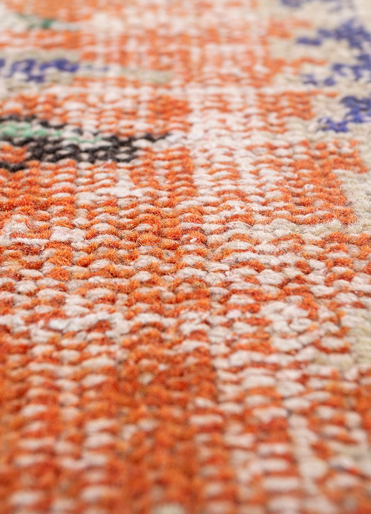 vintage red and orange wool hand knotted Rug - CloseUp