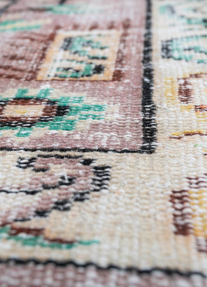 vintage pink and purple wool hand knotted Rug - CloseUp