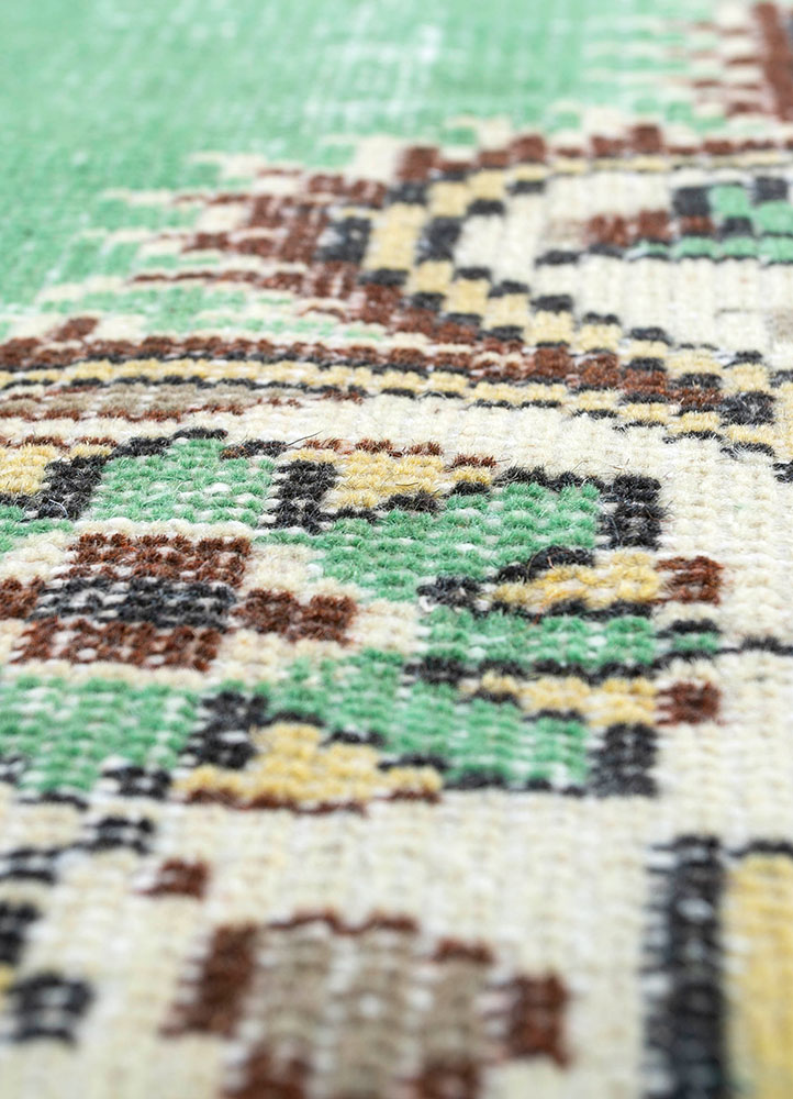 vintage green wool hand knotted Rug - CloseUp