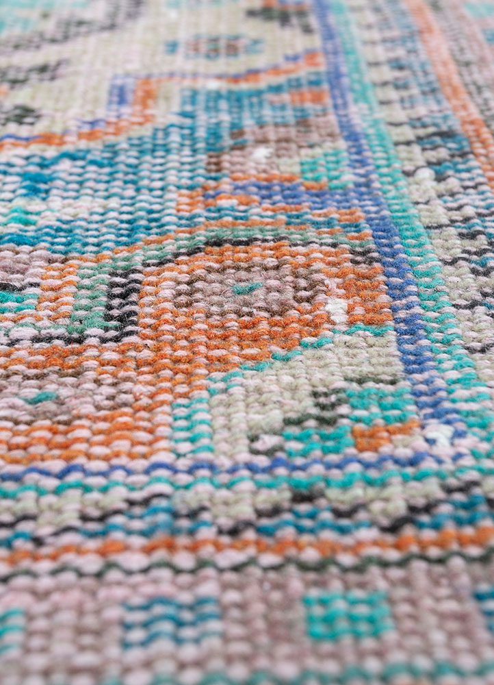 vintage red and orange wool hand knotted Rug - CloseUp