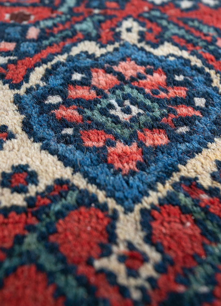 aalam red and orange wool hand knotted Rug - CloseUp