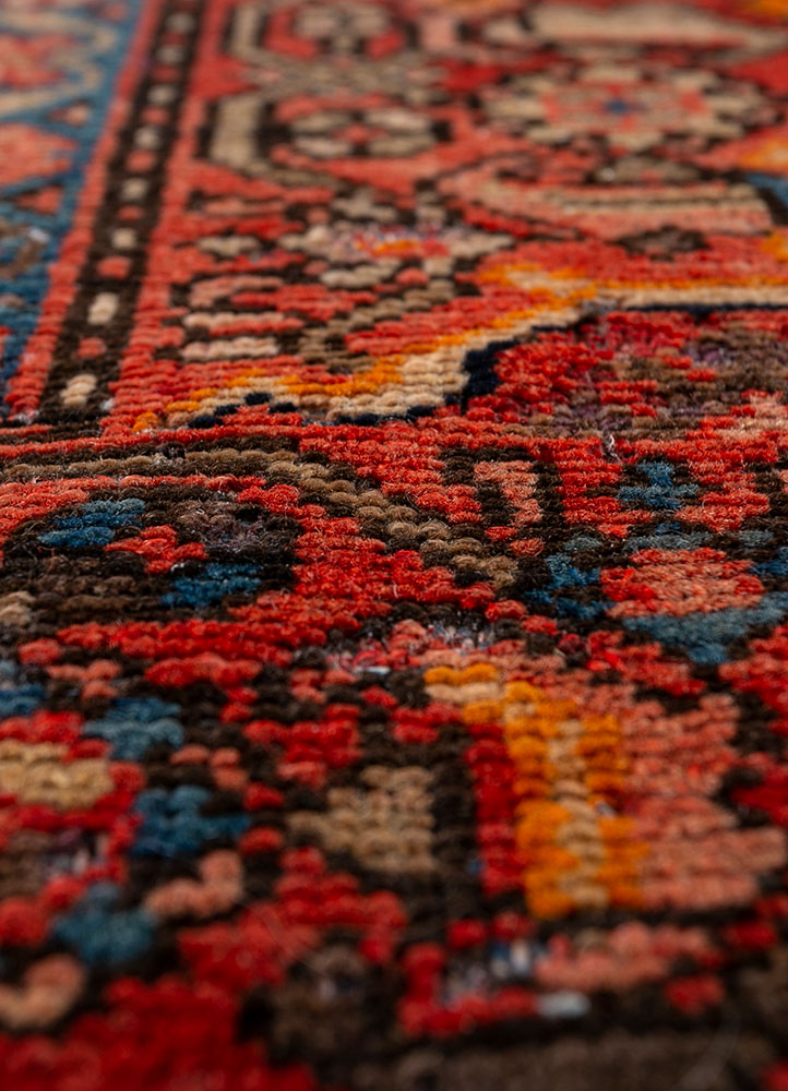 aalam red and orange wool hand knotted Rug - CloseUp