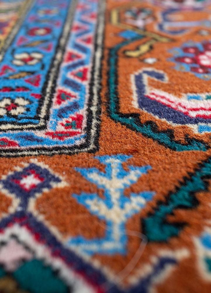 aalam red and orange wool hand knotted Rug - CloseUp