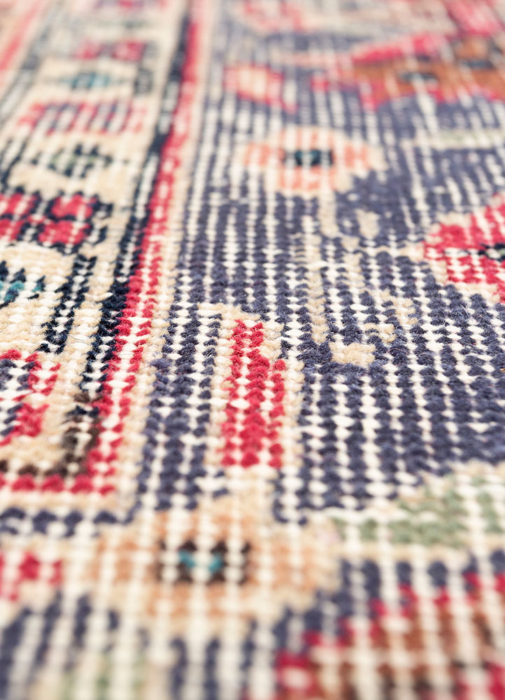 vintage red and orange wool hand knotted Rug - CloseUp