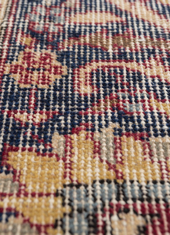 vintage red and orange wool hand knotted Rug - CloseUp