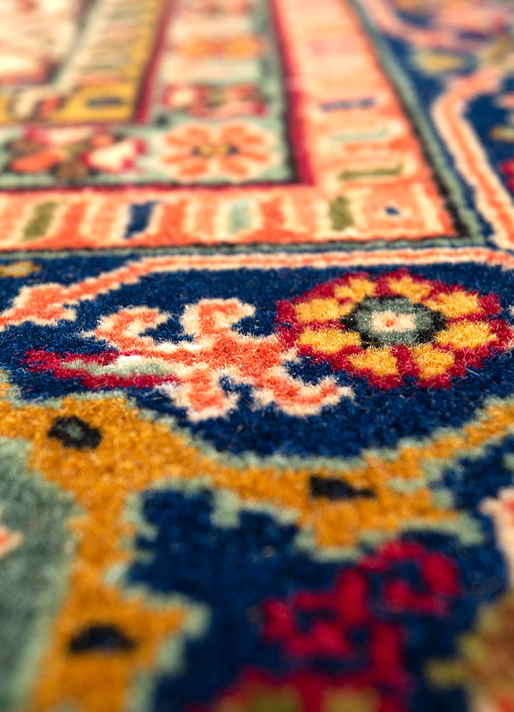 aalam red and orange wool hand knotted Rug - CloseUp