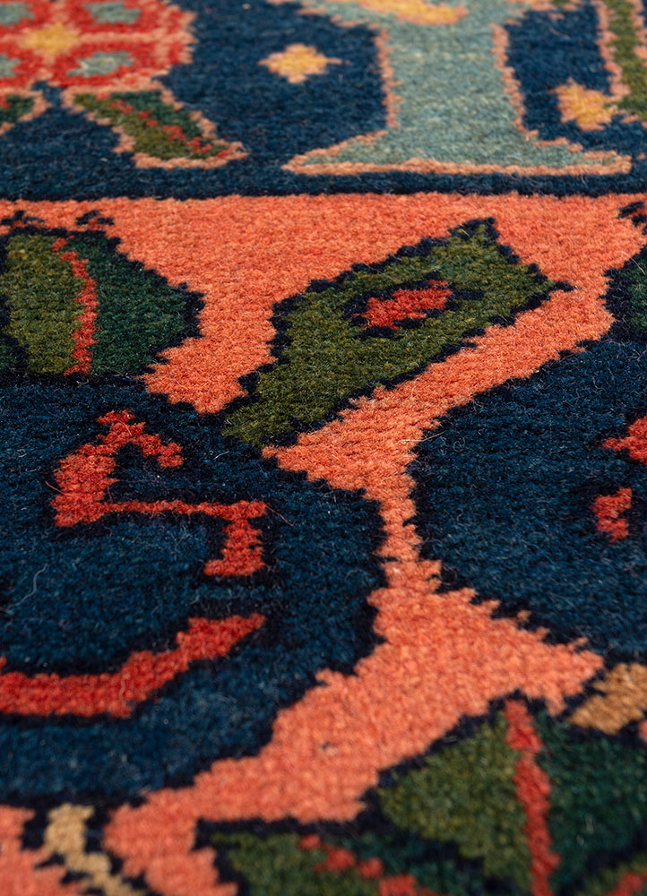 aalam red and orange wool hand knotted Rug - CloseUp