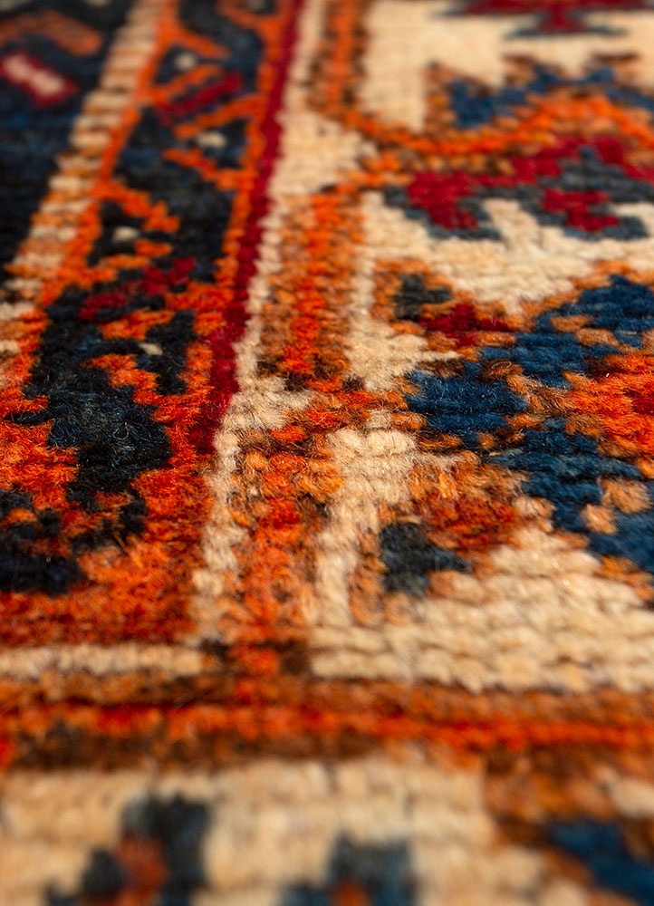 aalam red and orange wool hand knotted Rug - CloseUp