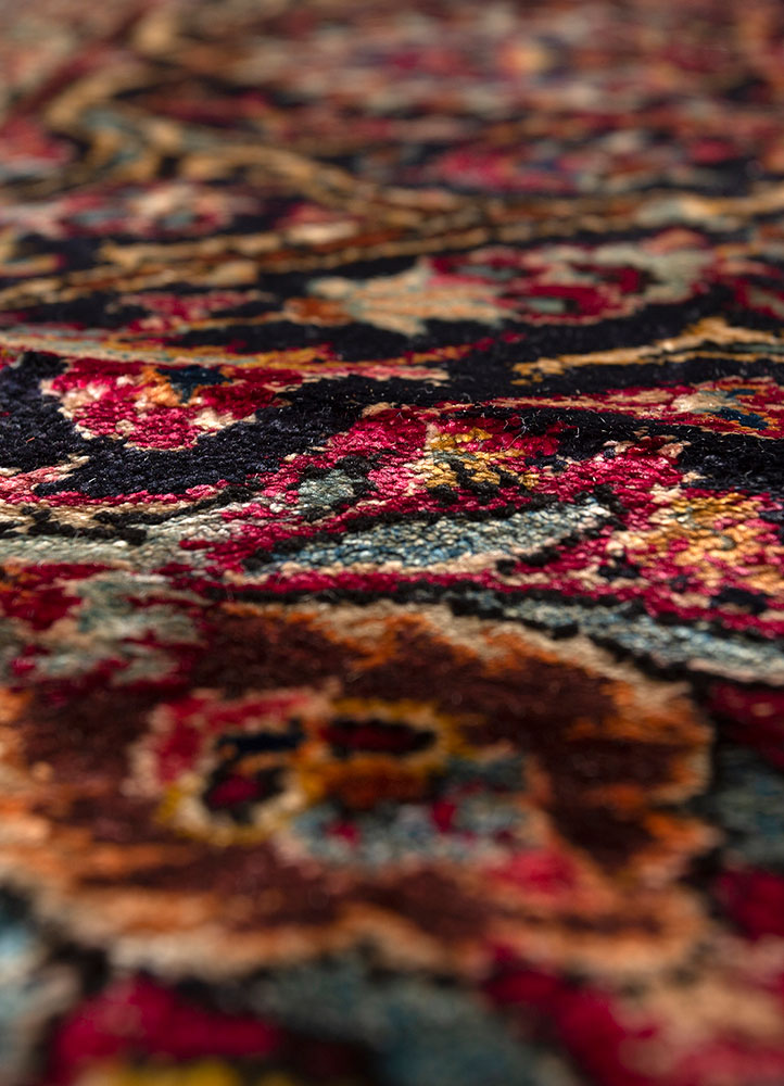 aalam red and orange wool hand knotted Rug - CloseUp