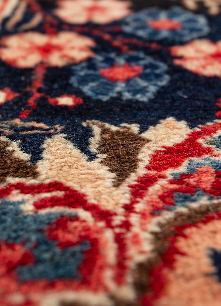 aalam red and orange wool hand knotted Rug - CloseUp