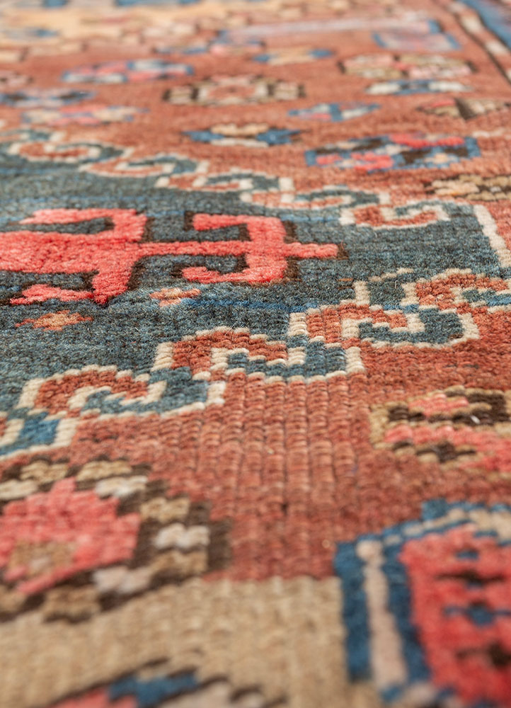 aalam red and orange wool hand knotted Rug - CloseUp