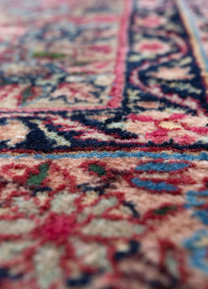 aalam red and orange wool hand knotted Rug - CloseUp
