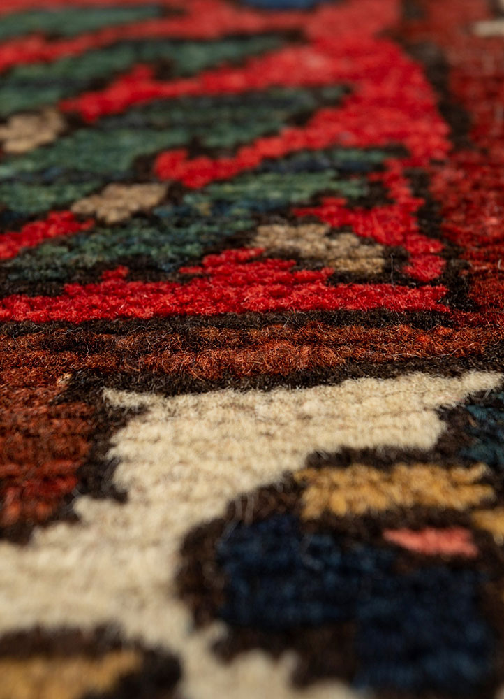 aalam red and orange wool hand knotted Rug - CloseUp