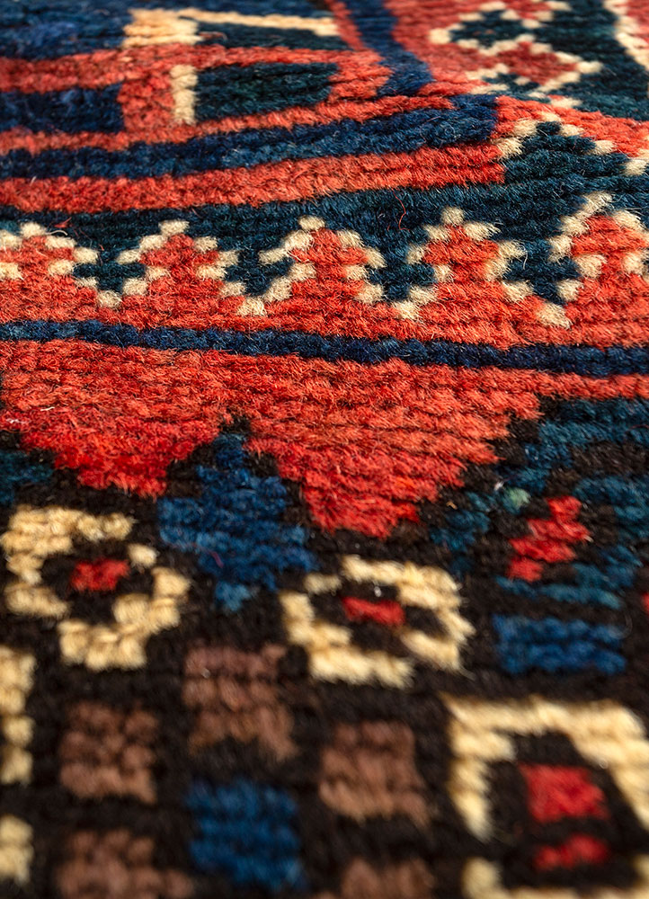 aalam red and orange wool hand knotted Rug - CloseUp
