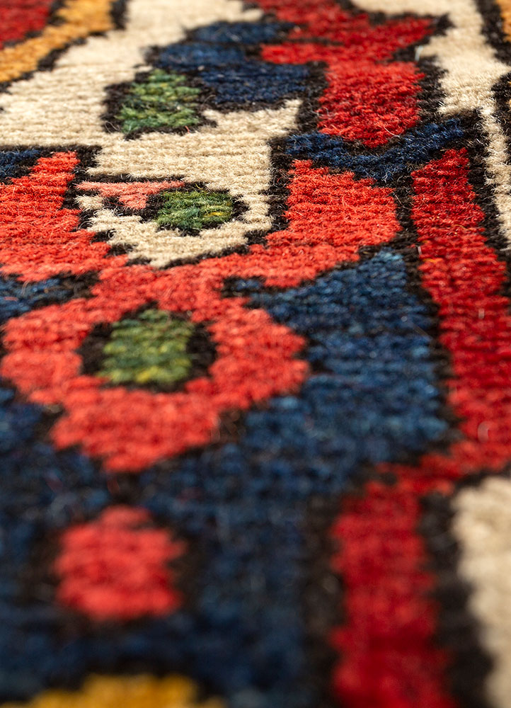 aalam red and orange wool hand knotted Rug - CloseUp